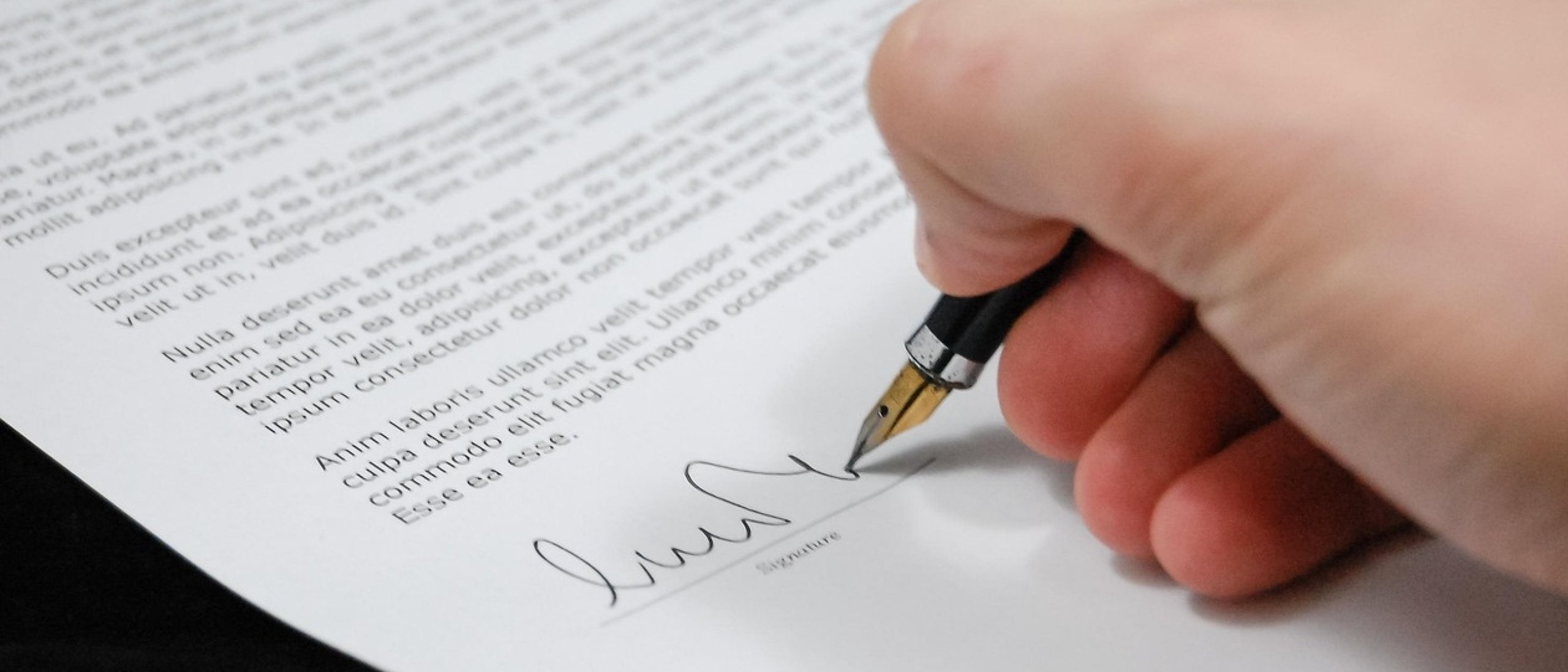 contract-signing-2560x1099